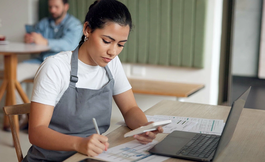 business woman looking at papers