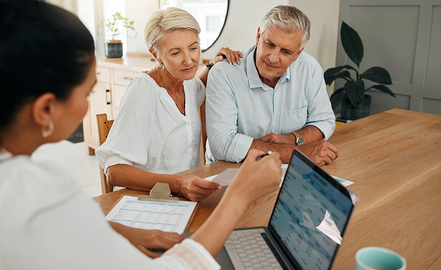 older couple looking at laptop