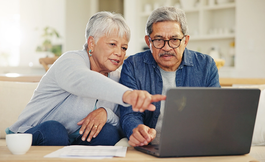 couple looking at laptop