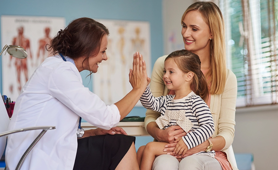 mother with daughter at doctor
